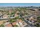 Scenic aerial view of the neighborhood showcasing well-manicured streets and beautiful homes with tile roofs at 401 E Barbara Dr, Tempe, AZ 85288