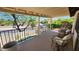 Relaxing balcony overlooking the pool with stylish furniture at 401 E Barbara Dr, Tempe, AZ 85288