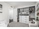 Spacious closet boasts custom built-in storage solutions, including shelving and drawers for optimal organization at 401 E Barbara Dr, Tempe, AZ 85288