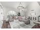 Spacious living room with high ceilings, ample seating, and a view of the front yard at 401 E Barbara Dr, Tempe, AZ 85288
