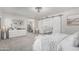 Spacious main bedroom features a large walk-in closet and dressing area, creating a luxurious retreat at 401 E Barbara Dr, Tempe, AZ 85288