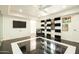 Bright bedroom featuring black and white accents, a ceiling fan, and unique artwork at 4525 N 66Th St # 112, Scottsdale, AZ 85251