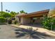 Charming home with a covered carport and well-maintained landscaping, offering curb appeal at 4525 N 66Th St # 112, Scottsdale, AZ 85251