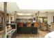 Open kitchen with modern design, a breakfast bar, and seamless integration with dining and living areas for easy living at 4525 N 66Th St # 112, Scottsdale, AZ 85251