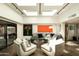 Bright living room with skylights, modern furniture, and sleek design, creating a comfortable and stylish ambiance at 4525 N 66Th St # 112, Scottsdale, AZ 85251