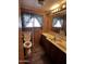 A bathroom containing a toilet, sink, window and mirror at 530 S Alma School Rd # 50, Mesa, AZ 85210