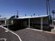 Attached carport providing convenient parking and protection from the elements at 530 S Alma School Rd # 50, Mesa, AZ 85210