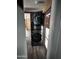 A hallway contains a black washing machine and dryer at 530 S Alma School Rd # 50, Mesa, AZ 85210