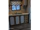 Functional kitchen with a double basin sink and ample cabinet space for efficient meal preparation at 530 S Alma School Rd # 50, Mesa, AZ 85210