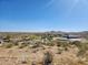 Community landscape with beautiful views of desert and nearby mountains at 17929 W Estes Way, Goodyear, AZ 85338