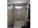 Small bathroom with a standard shower and tub combination at 3440 W Bluefield Ave, Phoenix, AZ 85053