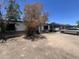 Modest single story home with a carport and desert landscaping at 3440 W Bluefield Ave, Phoenix, AZ 85053