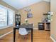 Dining area with natural light, hardwood floors, and a modern chandelier at 5640 E Bell Rd # 1099, Scottsdale, AZ 85254