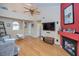 Spacious living room with high ceilings, fireplace, and comfortable seating at 5640 E Bell Rd # 1099, Scottsdale, AZ 85254