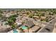 Aerial shot of backyard featuring a private pool and patio for outdoor enjoyment in the fenced yard at 7709 W Hearn Rd, Peoria, AZ 85381