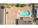 Aerial view of a private backyard oasis with a sparkling pool and patio area at 7709 W Hearn Rd, Peoria, AZ 85381