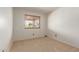 Bedroom featuring a window that fills the space with natural light, creating a bright and inviting atmosphere at 7709 W Hearn Rd, Peoria, AZ 85381