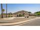 Exterior elevation of a two-story home with a front yard covered in low-maintenance desert landscaping at 7709 W Hearn Rd, Peoria, AZ 85381