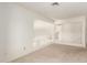 Bright loft features neutral decor and a clear view of the staircase and second-floor layout at 7709 W Hearn Rd, Peoria, AZ 85381