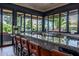 Well-appointed bar area with a stylish countertop and comfortable seating, great for entertaining at 7710 E Gainey Ranch E Rd # 115, Scottsdale, AZ 85258