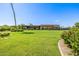 Spacious clubhouse with a large green lawn, perfect for outdoor activities and social gatherings at 7710 E Gainey Ranch E Rd # 115, Scottsdale, AZ 85258