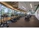 Bright fitness center with modern cardio equipment and large windows at 7710 E Gainey Ranch E Rd # 115, Scottsdale, AZ 85258