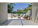Inviting patio with stylish outdoor furniture, perfect for relaxing and enjoying the serene surroundings at 7710 E Gainey Ranch E Rd # 115, Scottsdale, AZ 85258