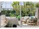 Outdoor patio view with comfortable seating and lush greenery at 7710 E Gainey Ranch E Rd # 115, Scottsdale, AZ 85258