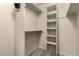 Walk-in closet with shelving and ample storage space, perfect for organizing your wardrobe at 8540 N Central Ave # 6, Phoenix, AZ 85020