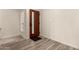 Inviting home entryway featuring wood-look floors, and a modern front door at 8540 N Central Ave # 6, Phoenix, AZ 85020