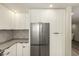 This bright kitchen features white cabinets, stainless steel appliances, and modern fixtures at 8540 N Central Ave # 6, Phoenix, AZ 85020