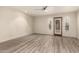Spacious living room featuring wood floors, neutral walls, and an abundance of natural light at 8540 N Central Ave # 6, Phoenix, AZ 85020