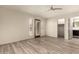 Spacious living room featuring wood floors, neutral walls, and an abundance of natural light at 8540 N Central Ave # 6, Phoenix, AZ 85020