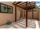 This beautiful patio features a pergola, tile flooring, and neutral stucco to create a relaxing and inviting outdoor space at 8540 N Central Ave # 6, Phoenix, AZ 85020