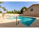 An inviting in-ground pool and spa are surrounded by privacy walls in this backyard oasis at 8540 N Central Ave # 6, Phoenix, AZ 85020