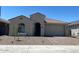 Charming single-story home with a low-maintenance landscaped front yard and a two car garage at 10217 W Fairmount Ave, Avondale, AZ 85392