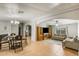 Spacious living room featuring a fireplace, tiled floors, and an archway leading to the dining area at 10951 N 91St Ave # 184, Peoria, AZ 85345