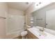 Well-lit bathroom offers a shower-tub combo and vanity sink at 11829 W Rosewood Dr, El Mirage, AZ 85335