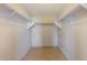 Walk-in closet features shelving for optimal storage at 11829 W Rosewood Dr, El Mirage, AZ 85335