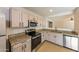 Well-equipped kitchen with stainless steel appliances and ample counter space at 11829 W Rosewood Dr, El Mirage, AZ 85335