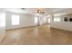 Bright and airy living room featuring tile flooring and a ceiling fan at 11829 W Rosewood Dr, El Mirage, AZ 85335
