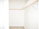 A clean and organized closet with ample shelving and hanging space at 1187 E Cowboy Cove Trl, San Tan Valley, AZ 85143