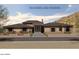 New construction home with desert landscaping and a modern design at 30660 N 120Th Ln, Peoria, AZ 85383