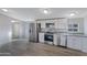 Well-equipped kitchen features stainless steel appliances, modern cabinetry, and granite countertops for a sleek and functional space at 320 E Mckellips Rd # 34, Mesa, AZ 85201
