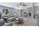 Bright living room boasts neutral colors, comfortable seating, view of a window and open access to adjacent rooms at 320 E Mckellips Rd # 34, Mesa, AZ 85201