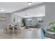 Expansive living area combining living, dining, and office spaces, creating a modern and functional open-concept home at 320 E Mckellips Rd # 34, Mesa, AZ 85201