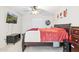 Bedroom showcasing a large bed, TV, ceiling fan, and simple decor for a comfortable, modern feel at 7756 N 19Th Ln, Phoenix, AZ 85021