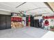 Tidy garage with overhead lighting, storage cabinets and tool organization at 7756 N 19Th Ln, Phoenix, AZ 85021