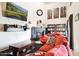 Living area features a fireplace, TV, and built in shelving at 7756 N 19Th Ln, Phoenix, AZ 85021