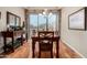 Dining room with hardwood floors and large window with natural light at 7955 E Chaparral Rd # 17, Scottsdale, AZ 85250